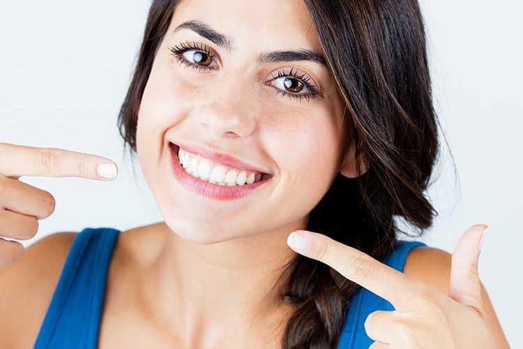 Cosmetic Dentistry 1 Happy lady with cosmetic treatment straight smile