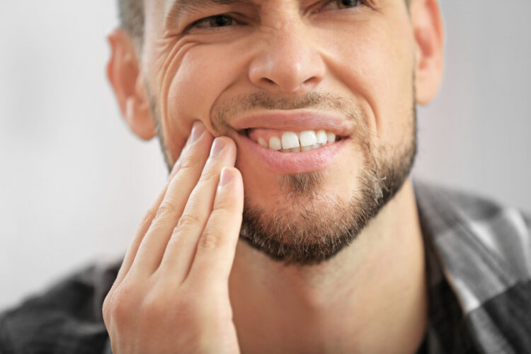 How long will you experience discomfort after tooth extraction?